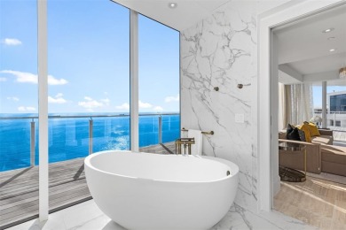 Indulge in the pinnacle of coastal luxury with this