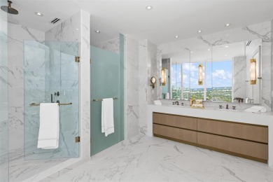 Indulge in the pinnacle of coastal luxury with this