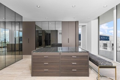 Indulge in the pinnacle of coastal luxury with this