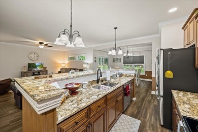 This exceptionally well-maintained 4-year-old home presents an - photo 3