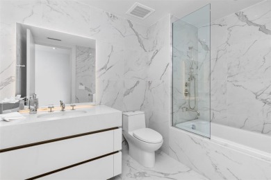 Indulge in the pinnacle of coastal luxury with this