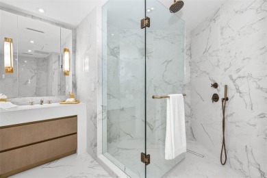 Indulge in the pinnacle of coastal luxury with this