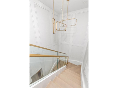 Indulge in the pinnacle of coastal luxury with this