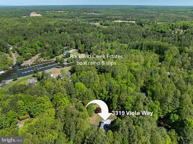 Welcome to 3319 Viola Way, where lake life slows down just - photo 3