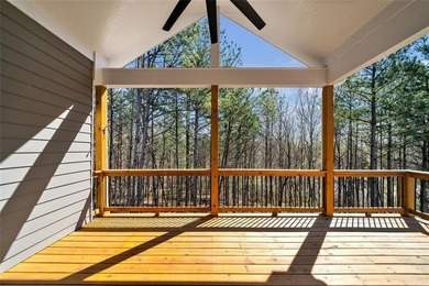 Nestled in the highly sought-after Chestatee Lake & Golf - photo 9