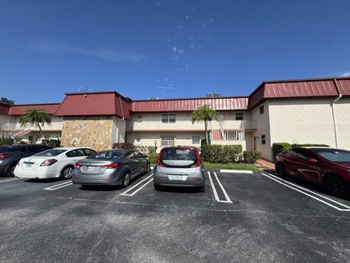 Welcome to this two-bedroom, two-bathroom condominium in - photo 1