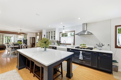 This beautifully renovated brick home is located in Huntington's - photo 11