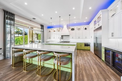 A statement of modern waterfront luxury, this extraordinary - photo 10