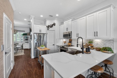 Experience elevated waterfront living in this impeccably updated