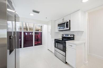 Rarely available 4-bedroom, 3-bath townhouse in Jupiter Harbour - photo 11
