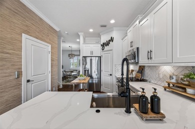 Experience elevated waterfront living in this impeccably updated