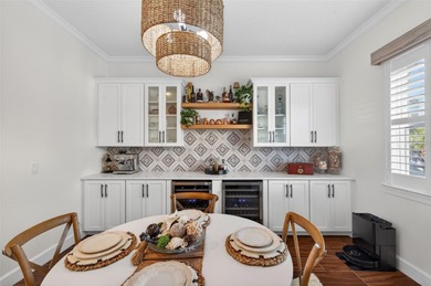 Experience elevated waterfront living in this impeccably updated