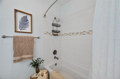 Experience elevated waterfront living in this impeccably updated