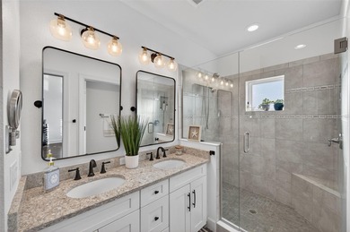 Experience elevated waterfront living in this impeccably updated