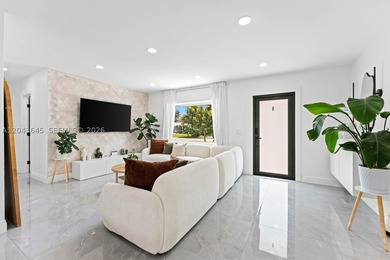 Welcome to this beautifully renovated 3-bedroom, 3-bathroom home - photo 3