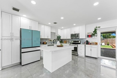 Welcome to this beautifully renovated 3-bedroom, 3-bathroom home - photo 8