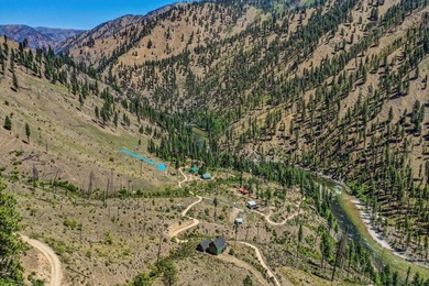 Remote backcountry getaway with 3 water rights, leveled site - photo 4