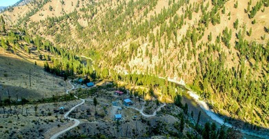 Remote backcountry getaway with 3 water rights, leveled site - photo 6