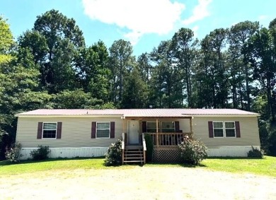 Lake Home For Sale in Saltillo, Mississippi