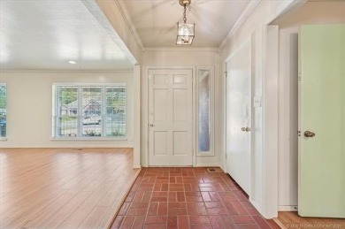 One-level full-brick home in Jenks Schools, featuring 4 bedrooms