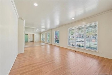 One-level full-brick home in Jenks Schools, featuring 4 bedrooms