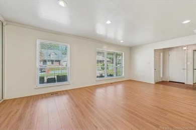 One-level full-brick home in Jenks Schools, featuring 4 bedrooms