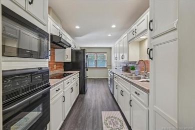 One-level full-brick home in Jenks Schools, featuring 4 bedrooms