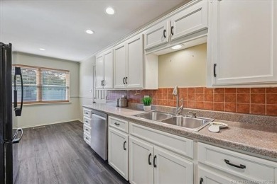 One-level full-brick home in Jenks Schools, featuring 4 bedrooms