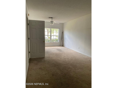 This spacious end-unit condo offers an inviting open floor plan - photo 14
