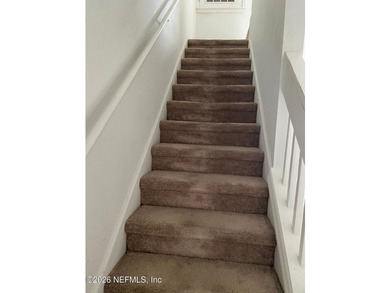This spacious end-unit condo offers an inviting open floor plan - photo 15