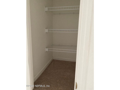This spacious end-unit condo offers an inviting open floor plan - photo 20