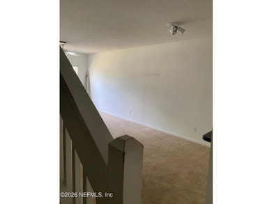This spacious end-unit condo offers an inviting open floor plan - photo 23