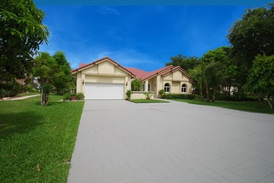 Welcome to this beautifully maintained custom-built 4-bedroom - photo 1