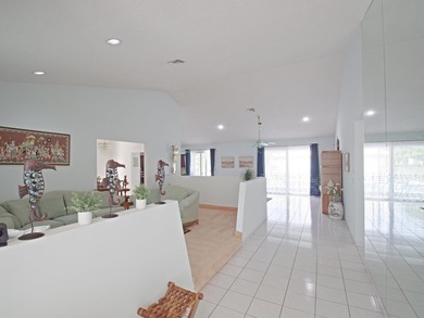 Welcome to this beautifully maintained custom-built 4-bedroom - photo 2
