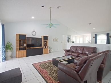 Welcome to this beautifully maintained custom-built 4-bedroom - photo 6