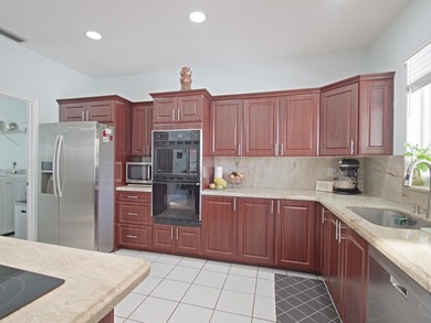 Welcome to this beautifully maintained custom-built 4-bedroom - photo 8