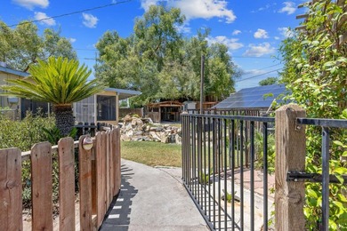 This charming cornerlot property blends comfort, functionality - photo 29