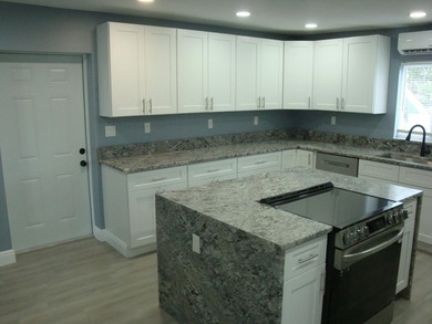 Welcome to this beautiful four-bedroom, two-bathroom single - photo 9