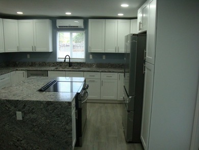 Welcome to this beautiful four-bedroom, two-bathroom single - photo 10