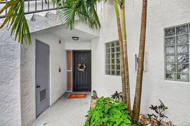 Create your own masterpiece in this spacious first floor lake - photo 1