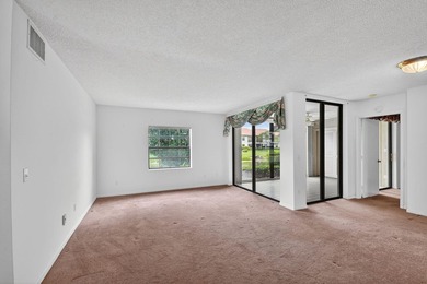 Create your own masterpiece in this spacious first floor lake - photo 4