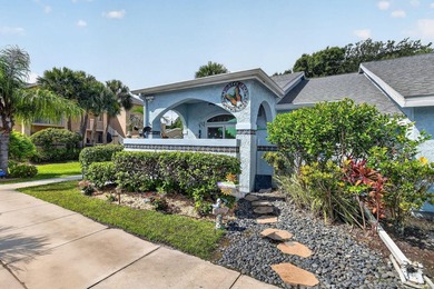 This sought-after, move-in-ready corner unit villa in the - photo 3