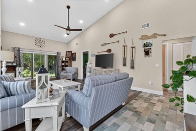 This sought-after, move-in-ready corner unit villa in the - photo 4