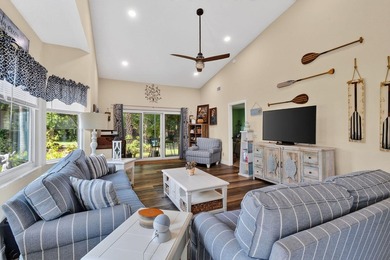 This sought-after, move-in-ready corner unit villa in the - photo 5