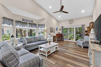 This sought-after, move-in-ready corner unit villa in the - photo 7