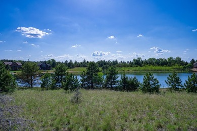 This beautiful lot on Stone Gate Lake offers sunset views and a - photo 11