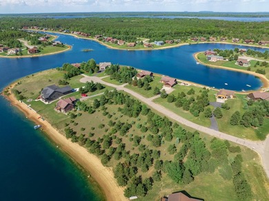 This beautiful lot on Stone Gate Lake offers sunset views and a - photo 23