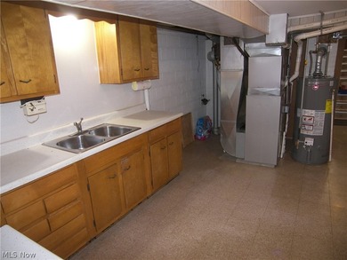 Here is a custom built 1965 1 owner brick bungalow awaiting its - photo 26