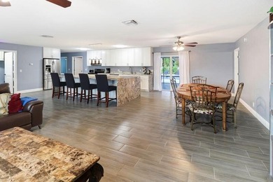 Welcome to this beautiful four-bedroom, two-bathroom single - photo 8