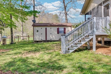 Charming 3BR/2BA home on a level lot just minutes from town in a - photo 5